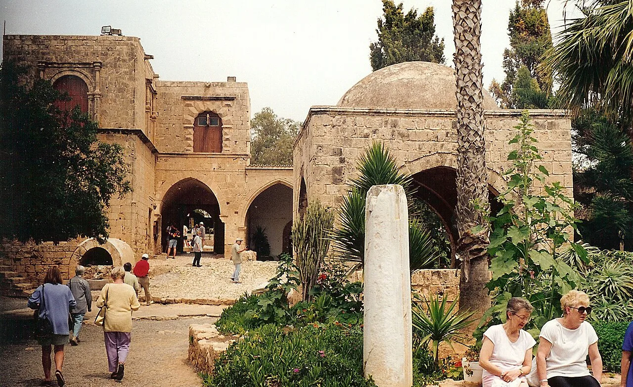 Visitors in the courtyard of Agia Napa Monastery, Ayia Napa.