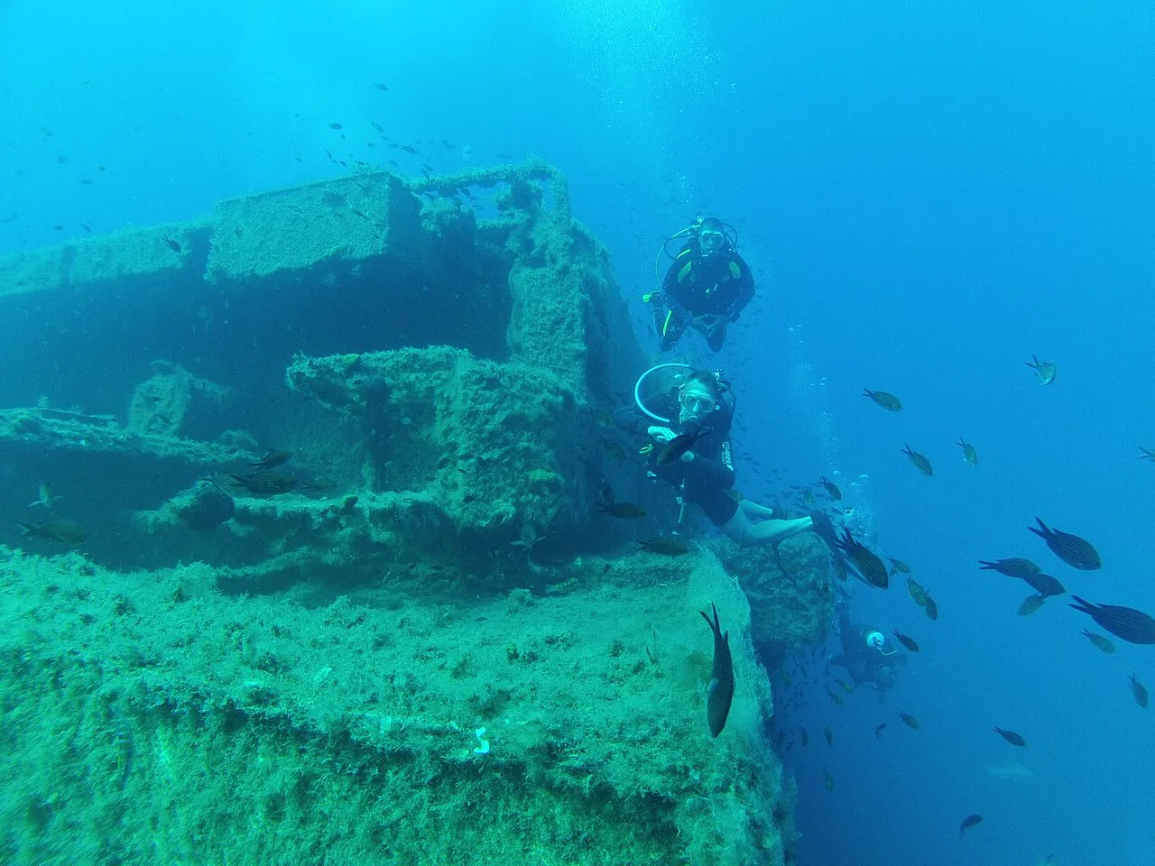 Divers exploring the Zenobia wreck.