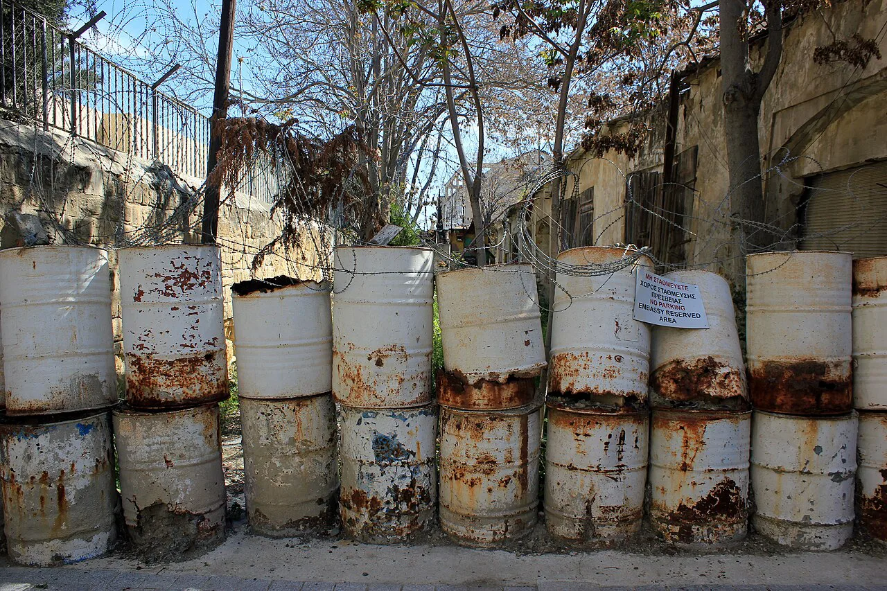 Barrels blocking a street at the Nicosia Green Line.