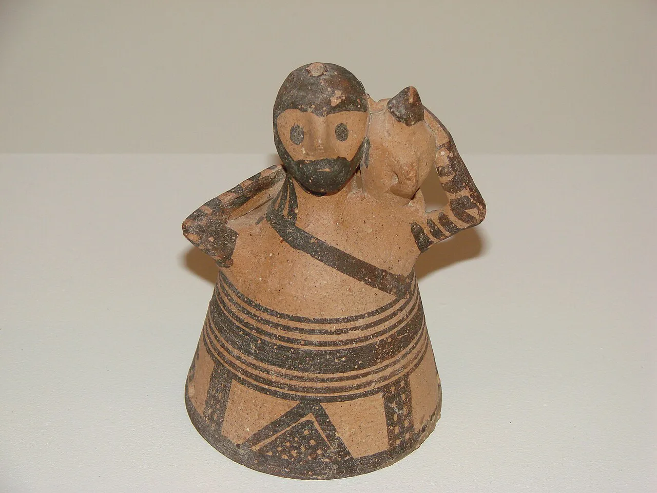 Terracotta figurine of a bearded man from Amathus, Limassol Archaeological Museum.