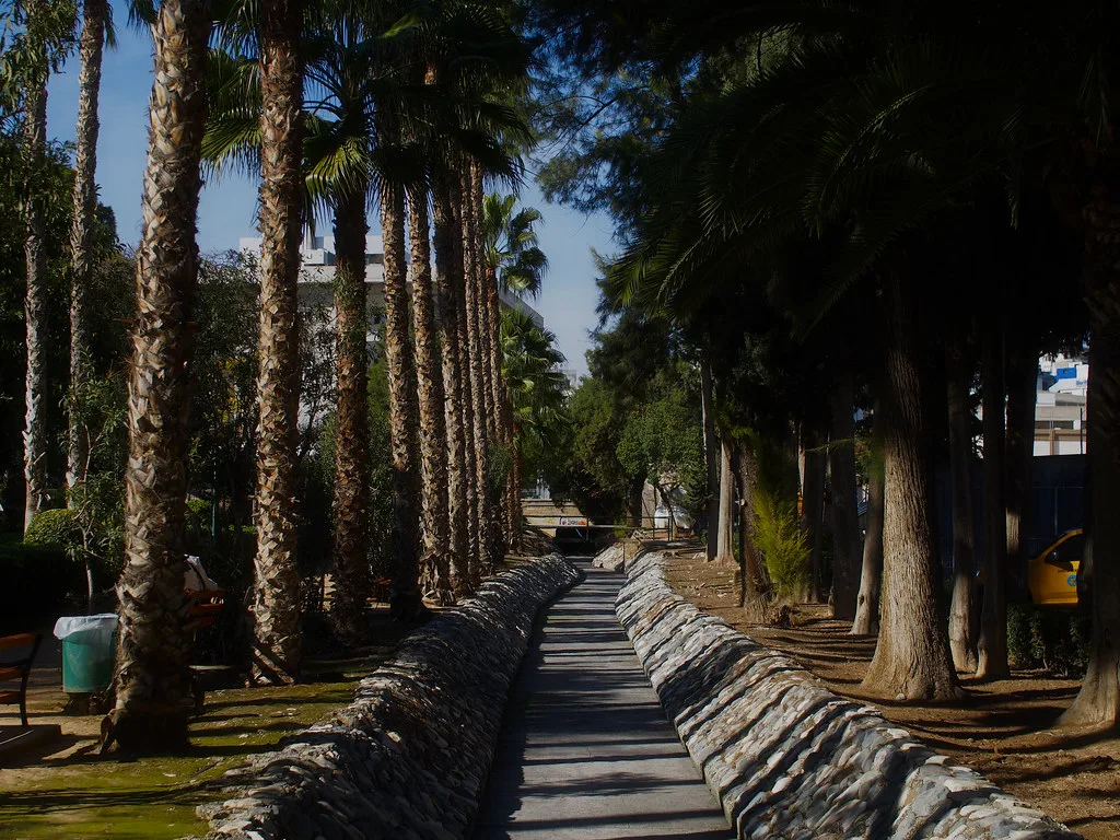 Shaded path in the Limassol Municipal Gardens.