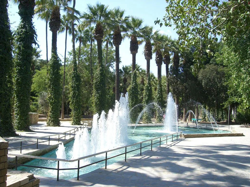 A fountain and palms in a Nicosia park.