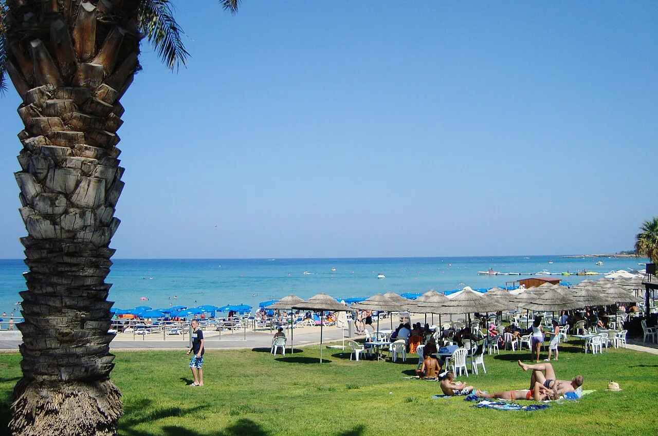 Sunbeds and umbrellas on Protaras beach.