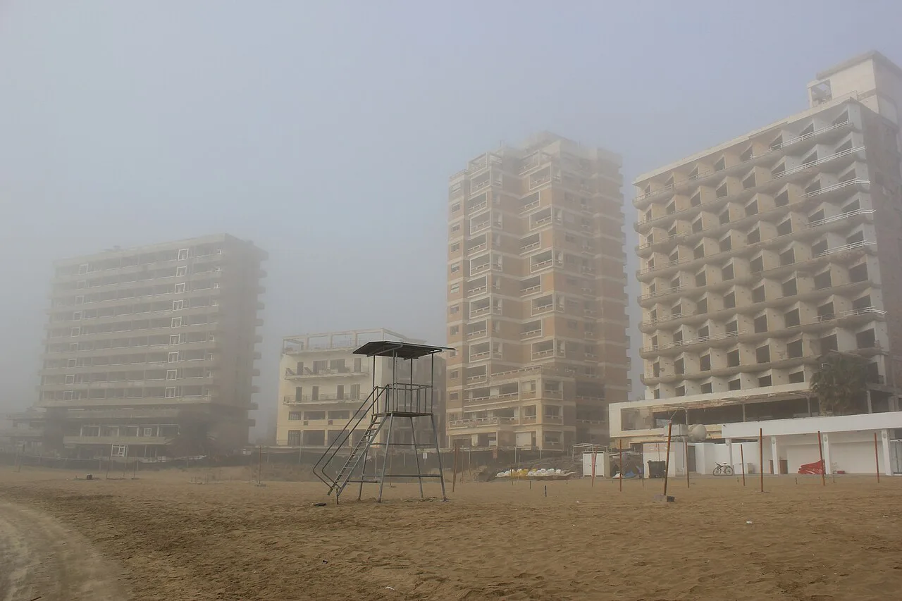 Varosha hotels seen from the beach in mist.
