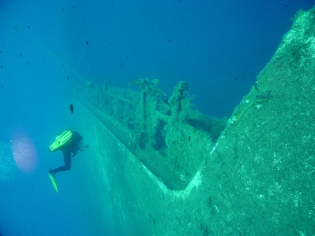 Diver beside the Zenobia wreck.